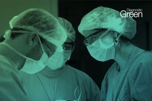 three people dressed in scrubs