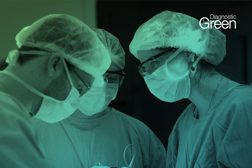 three people dressed in scrubs