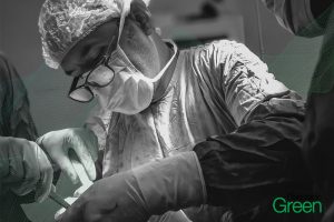 black and white image of surgeon working close up