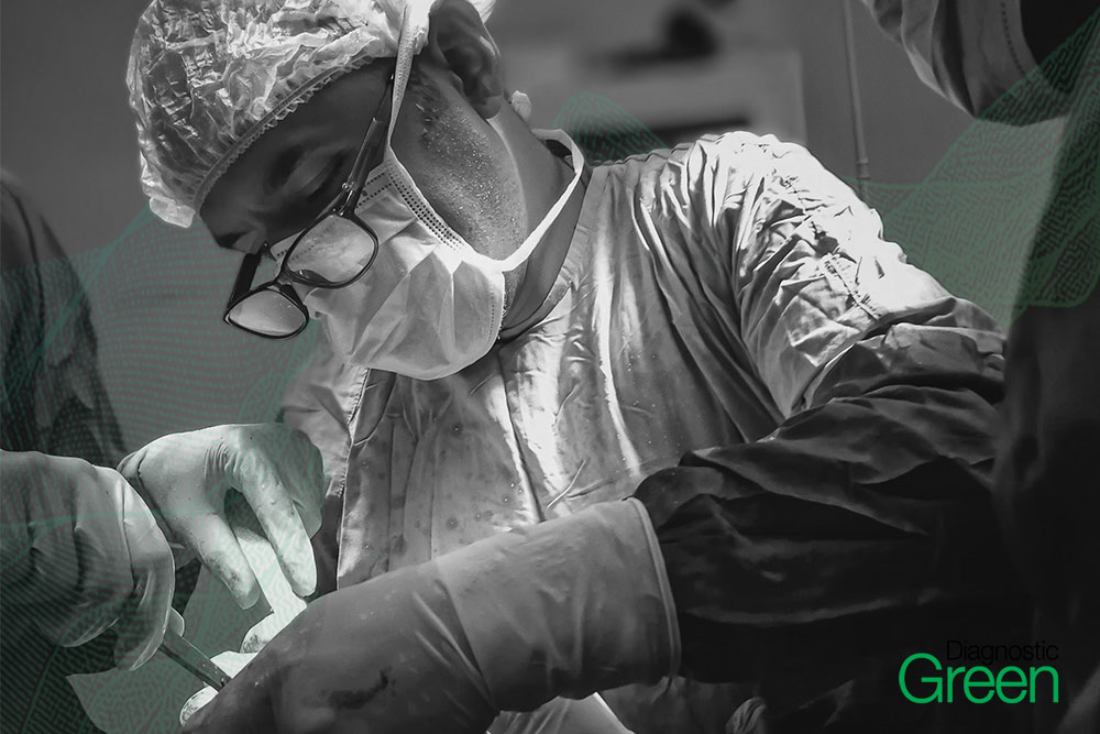 black and white image of surgeon working close up