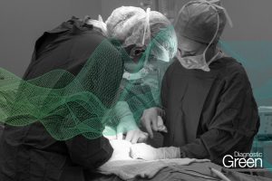 3 nurses assisting in surgery